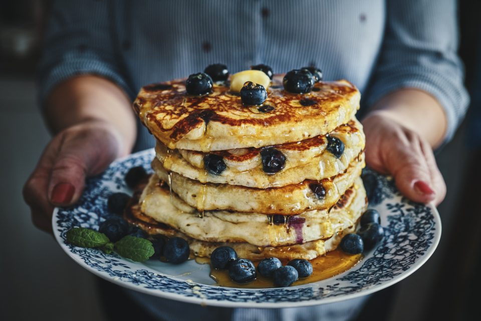 Stack of Pancakes with Maple Syrup and Fresh Blueberries