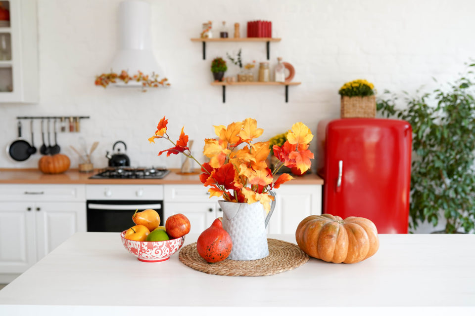 autumn table with vegetables in kitchen.