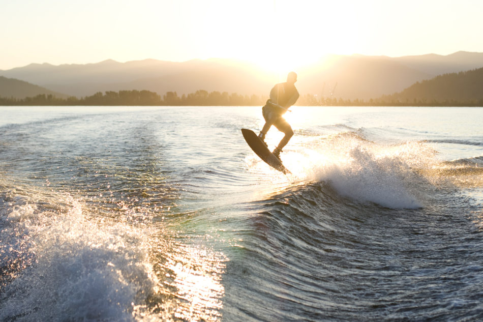 Man riding the waves on a wakeboard