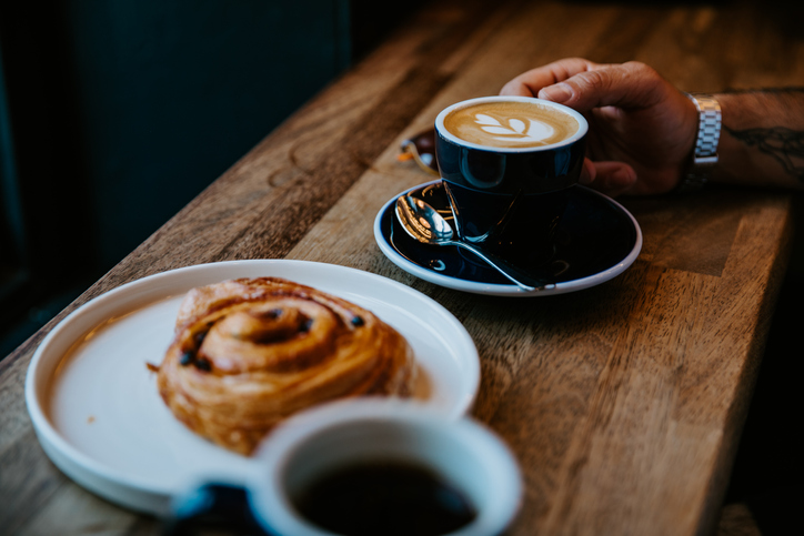 Delicious flat white coffee with latte art in a cup