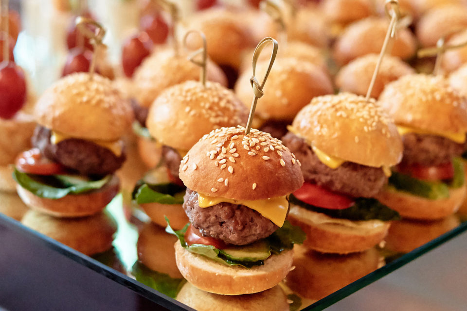 Buffet table with mini hamburgers