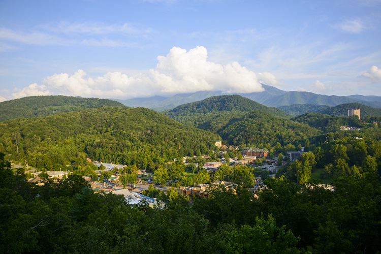 High angle view in summer of downtown Gatlinburg, Tennessee, a popular vacation destination located at the entrance to Great Smoky Mountains National Park.
