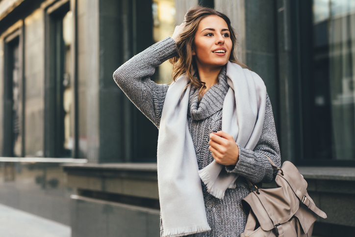 Portrait of a beautiful young woman outdoors.