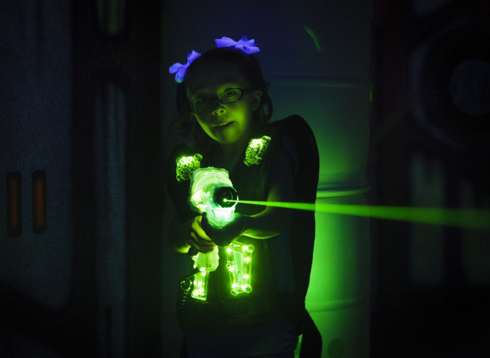 girl playing laser tag
